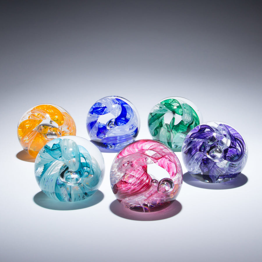 Wagner_CircleofLifePaperweight_Group_174943_W26_ArtistImage