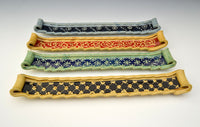top to bottom: blue with black accent, honey with red accent, green with blue accent, honey with black accent