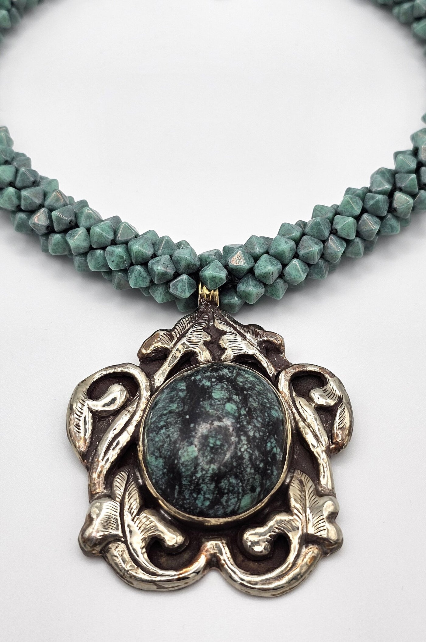 Tibetan Turquoise Scroll Pendant