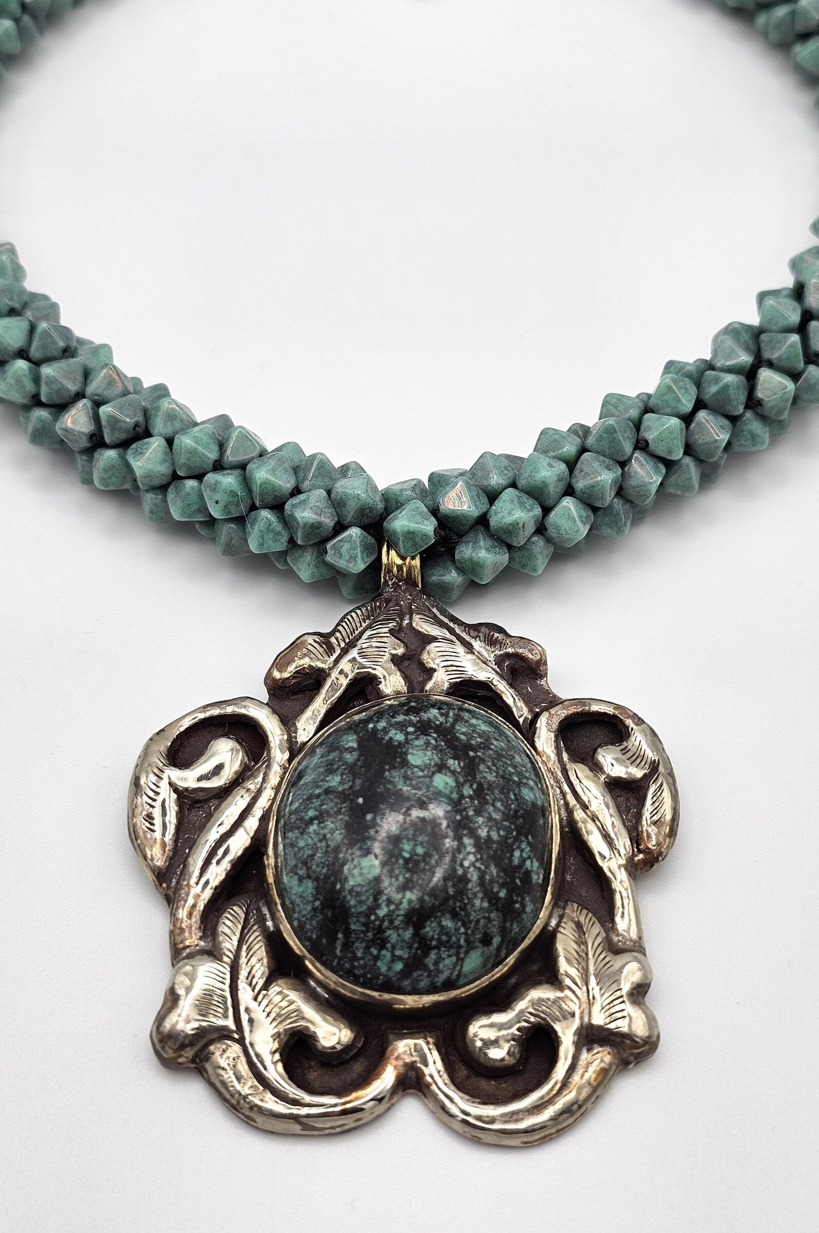 Tibetan Turquoise Scroll Pendant