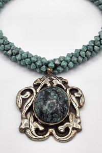 Tibetan Turquoise Scroll Pendant