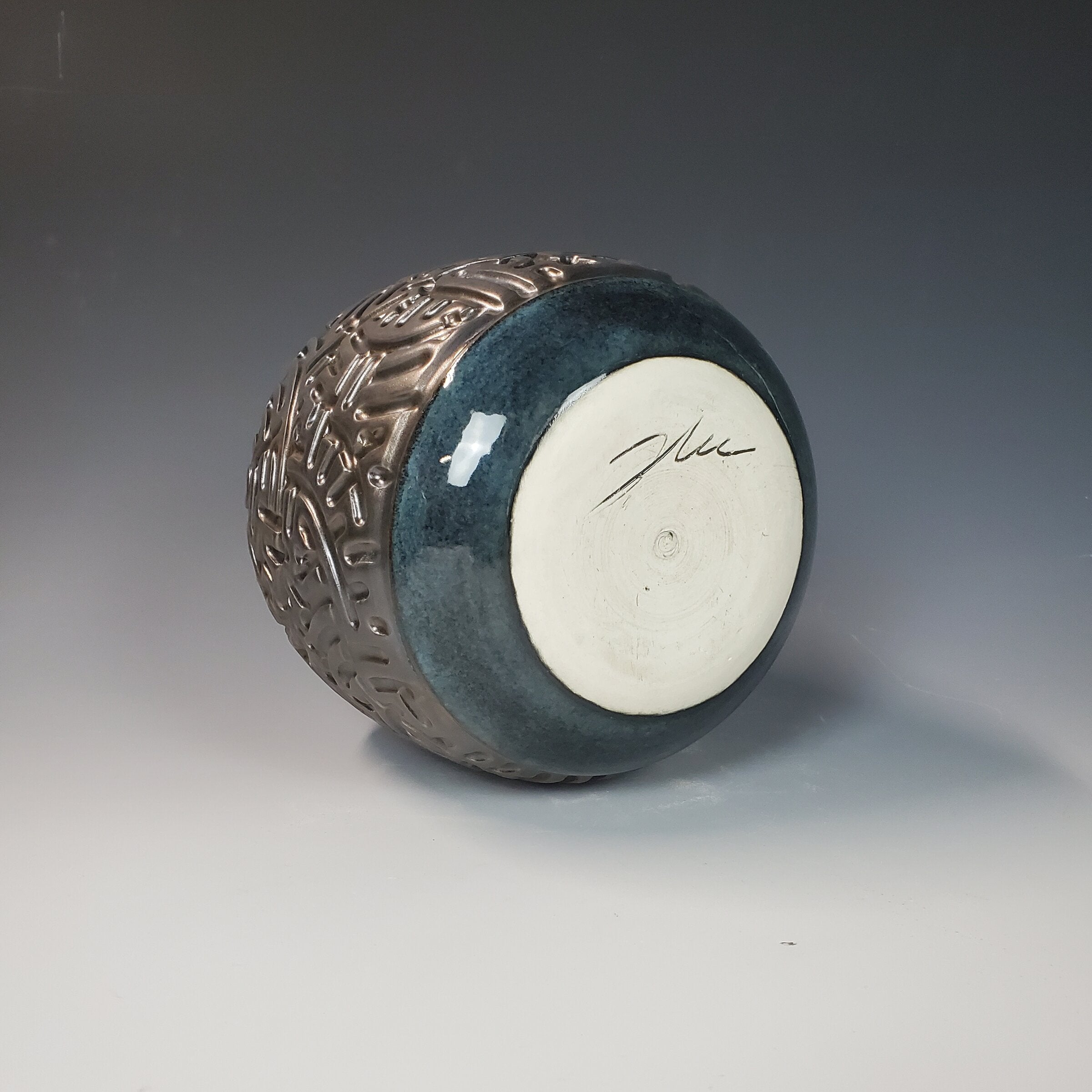 Closed Form Carved Moon Pot