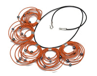 orange leather with gray pearls 