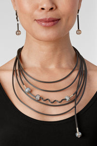 shown with the shades of gray necklace