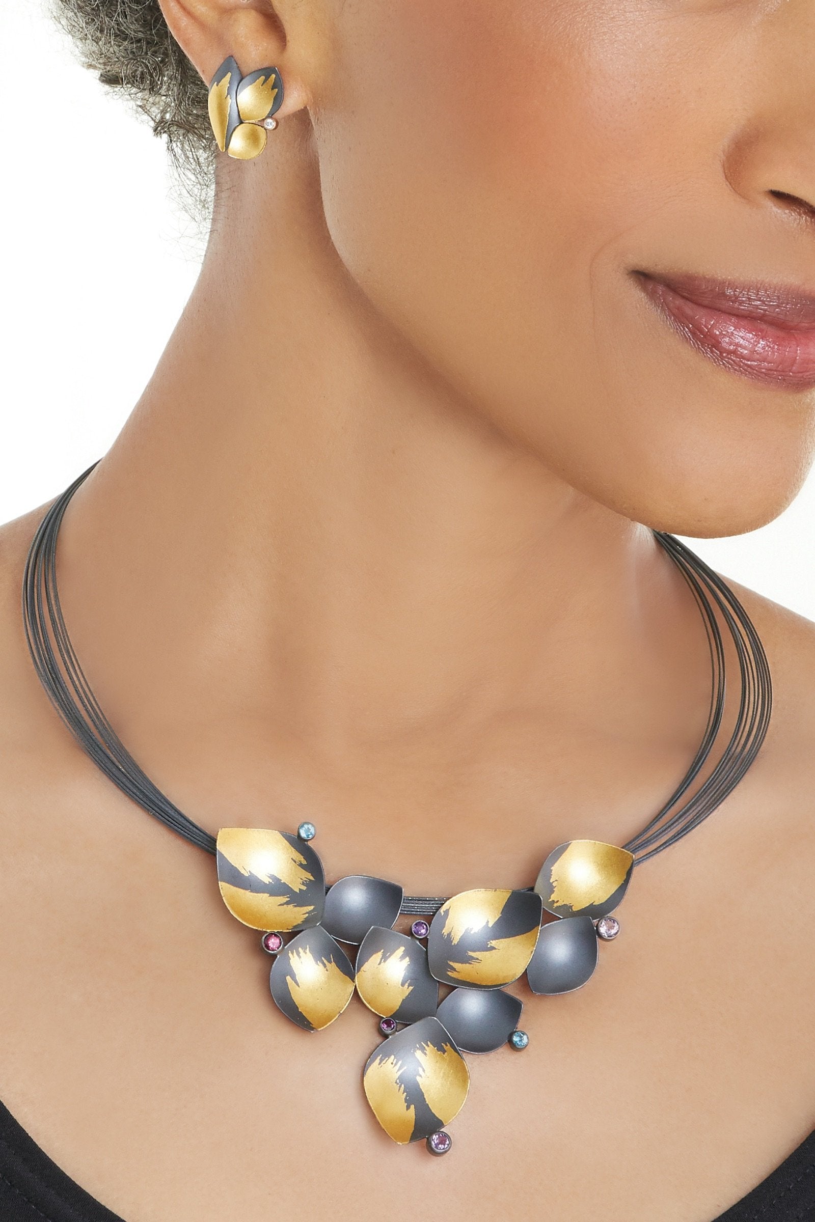 necklace shown with diamond petals earrings