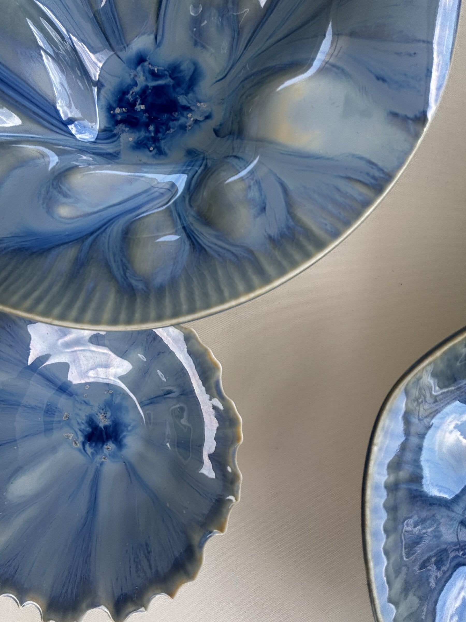 Porcelain Wall Installation with Deep Teal Crystalline