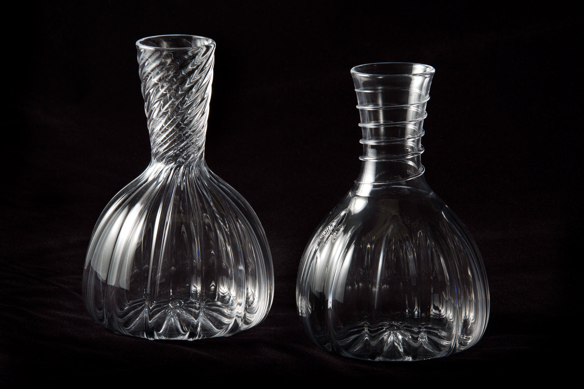Twisted Optic Rib Decanter (left). Spiral Wrap Decanter (right).