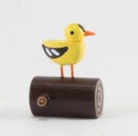 Goldfinch on Log