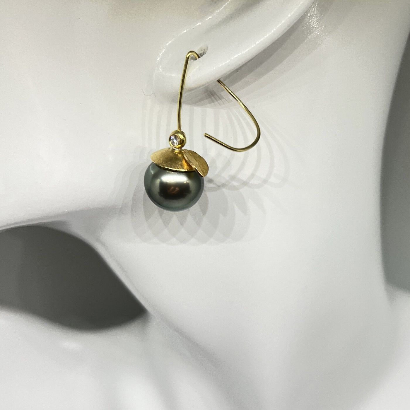 showing left earring