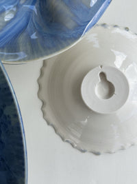 Porcelain Wall Installation with Deep Teal Crystalline