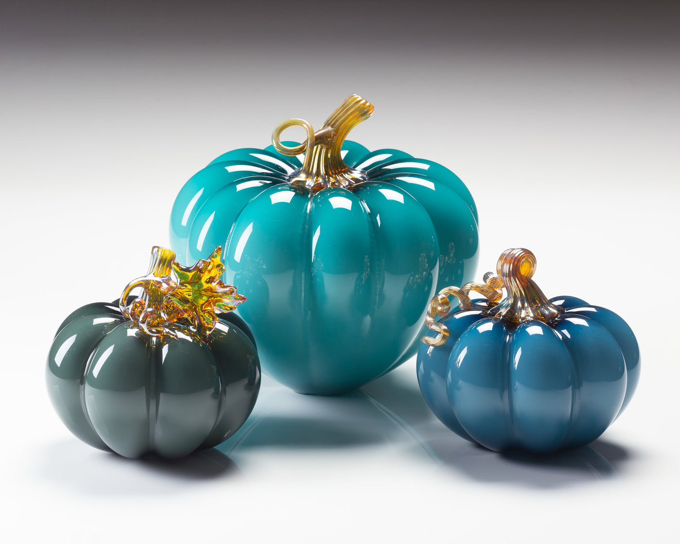 left to right: smoky blue, lagoon, steel blue