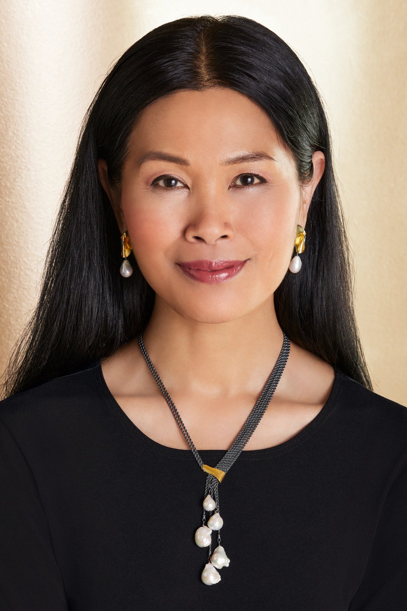 shown with the artist's harmony earrings