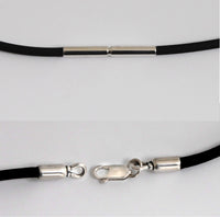 rubber cord with bayonet clasp (top) and leather cord with lobster clasp (bottom)