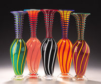 left to right: dark green, peach, black, yellow, purple
