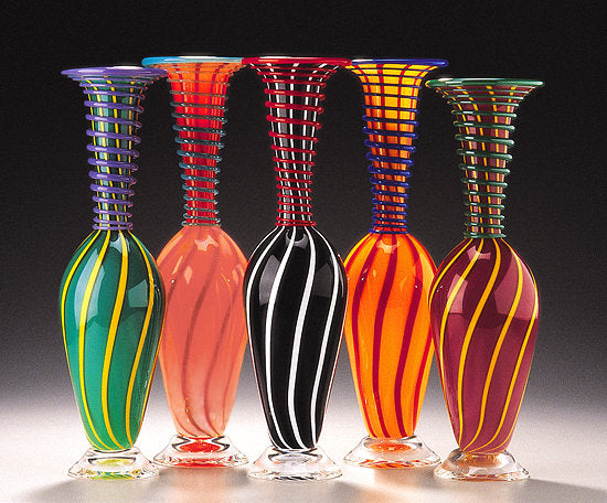 left to right: dark green, peach, black, yellow, purple