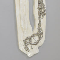 White Wall Sculpture With Silver Accents