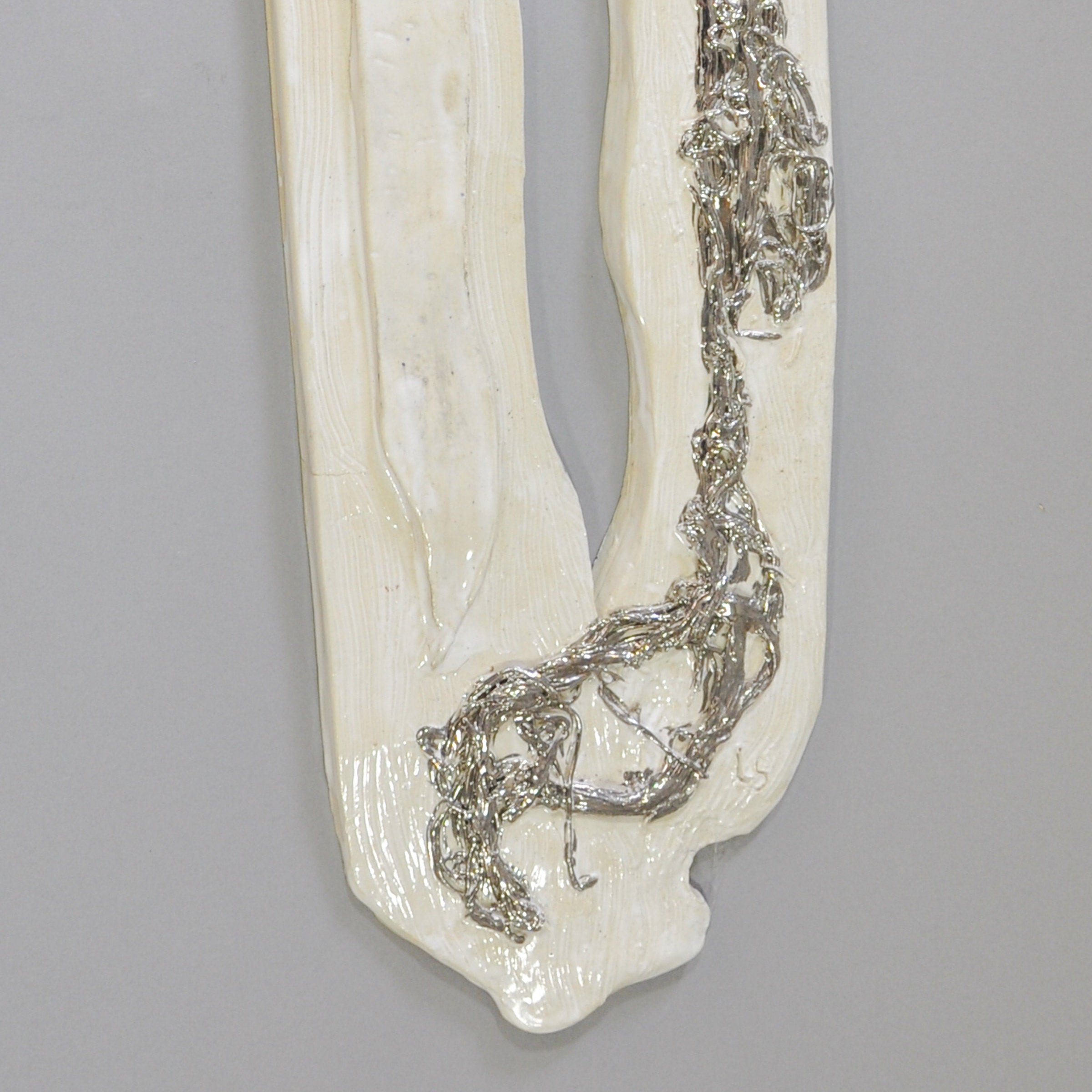 White Wall Sculpture With Silver Accents