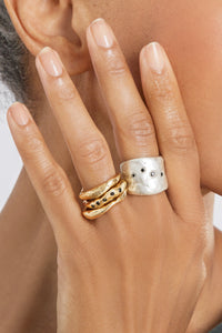 shown with the artist's Bronze Stacking Rings with Black Diamonds