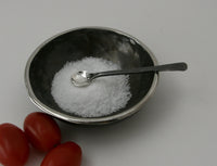 shown with a stainless steel bowl by nicole and harry hansen