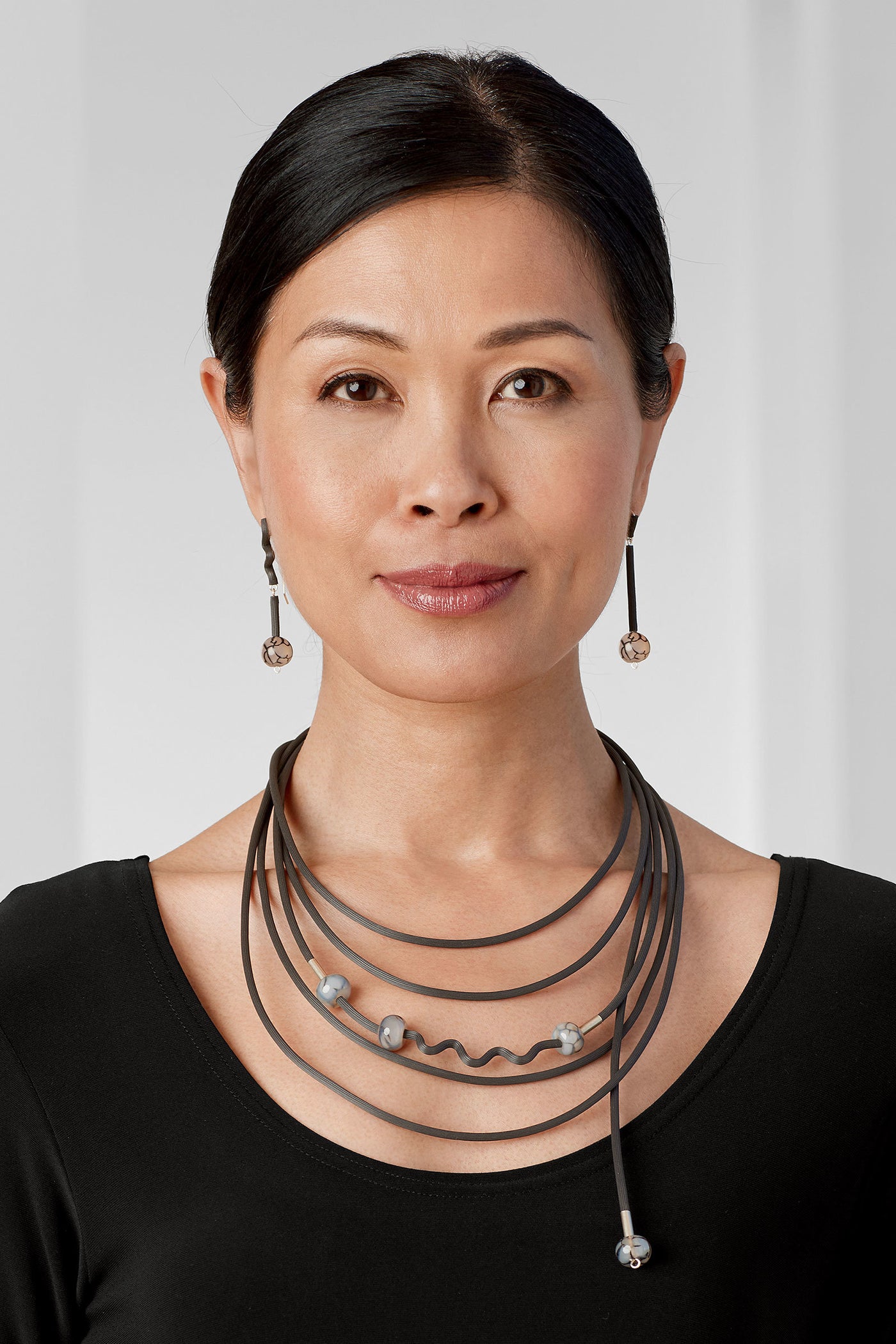 shown with the shades of gray earrings