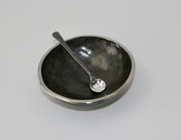 shown with a stainless steel bowl by nicole and harry hansen