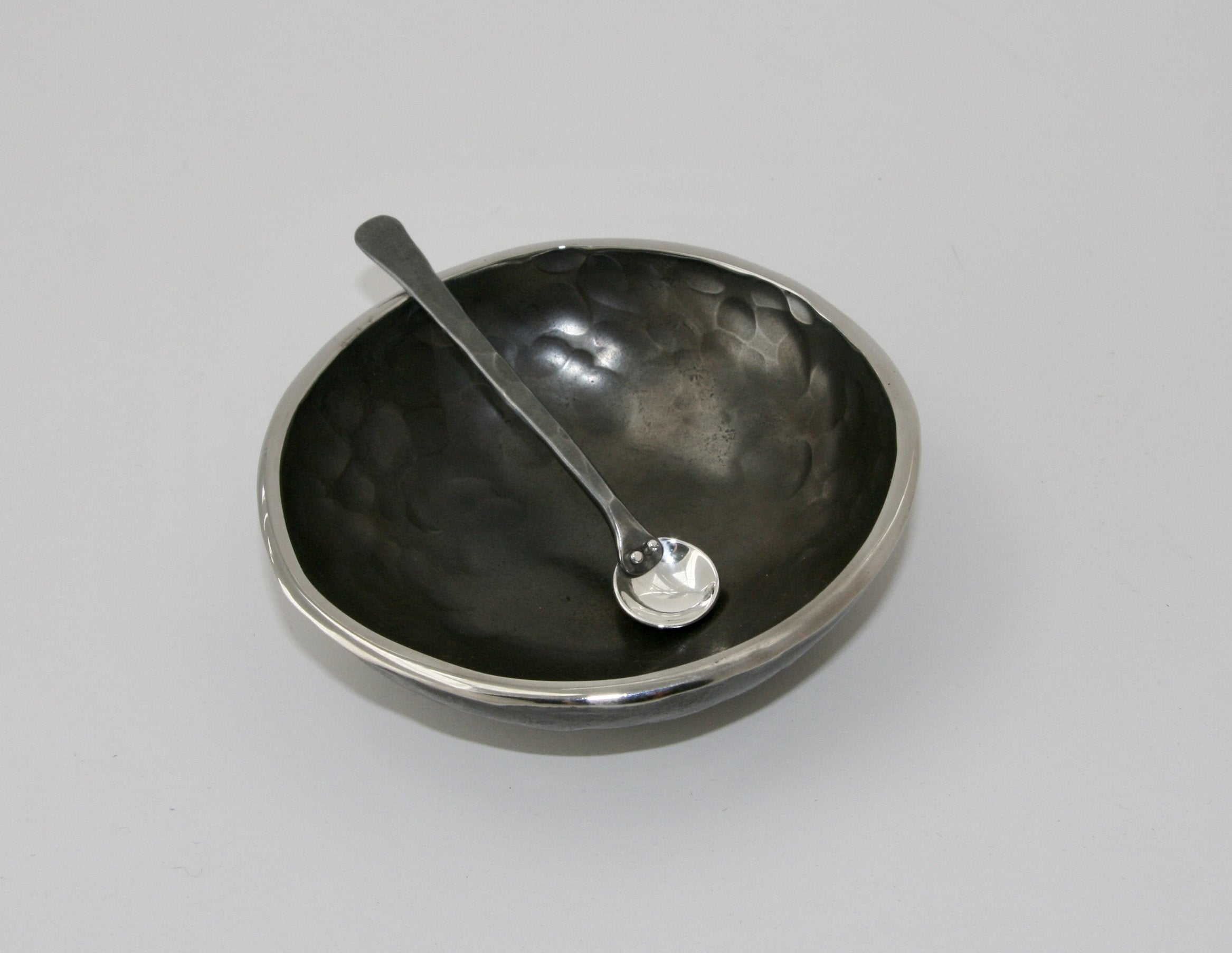 shown with a stainless steel bowl by nicole and harry hansen