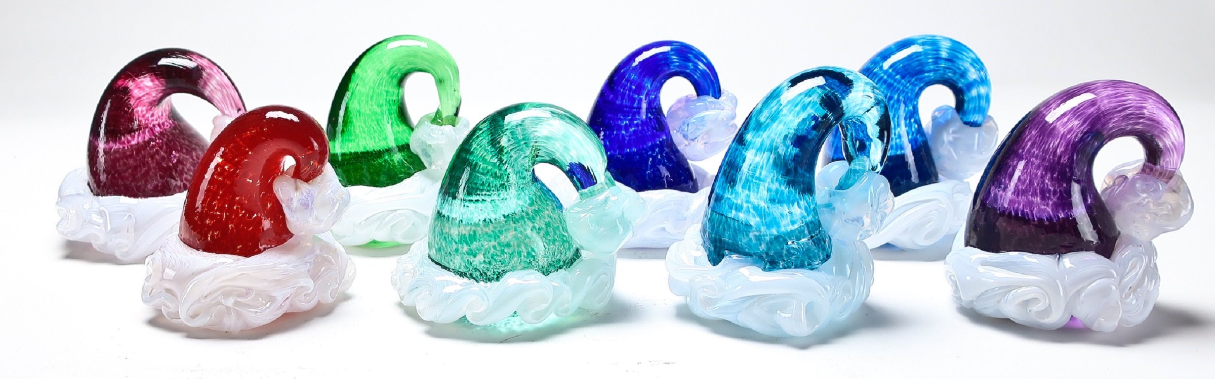 left to right: ruby, red, light green, light emerald, cobalt blue, light blue, aqua, purple
