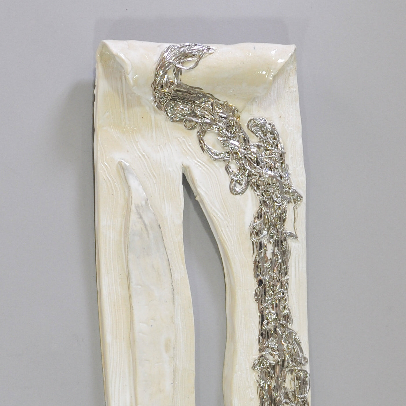 White Wall Sculpture With Silver Accents