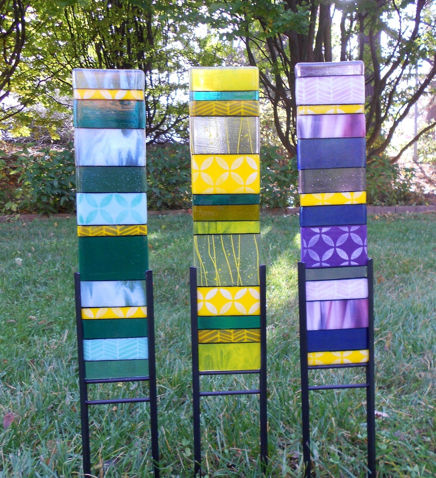 blue puya, yellow daffodil, purple iris