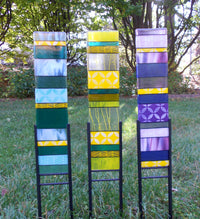blue puya, yellow daffodil, purple iris