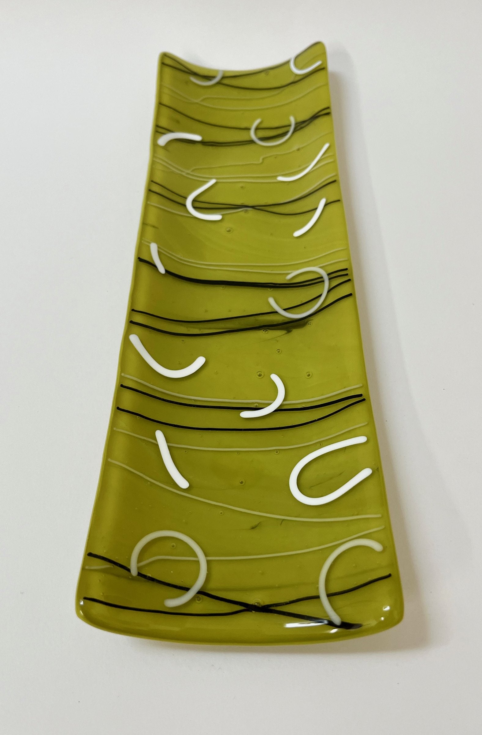 White Arcs on Green Platter