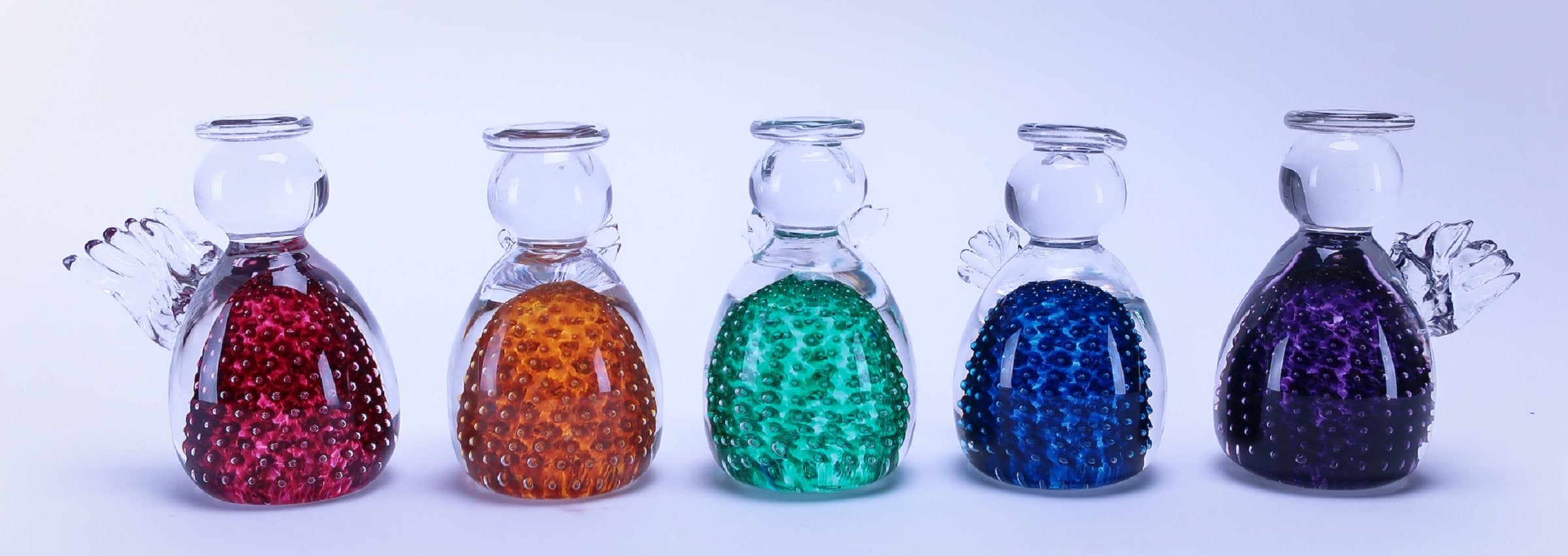 left to right: Ruby, Gold, Emerald, Cobalt, or Purple
