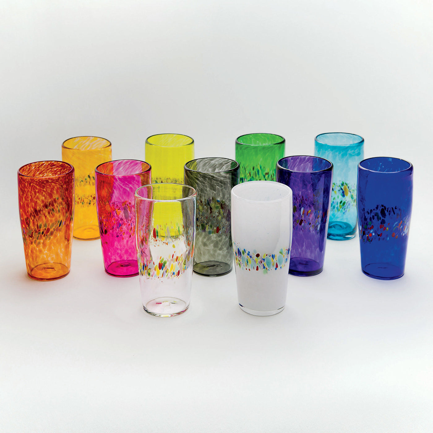 back row left to right: gold, lime, emerald, aqua; middle row left to right: red, pink, gray, purple, cobalt; front row left to right: clear, white