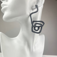 example of the earring's flexibility