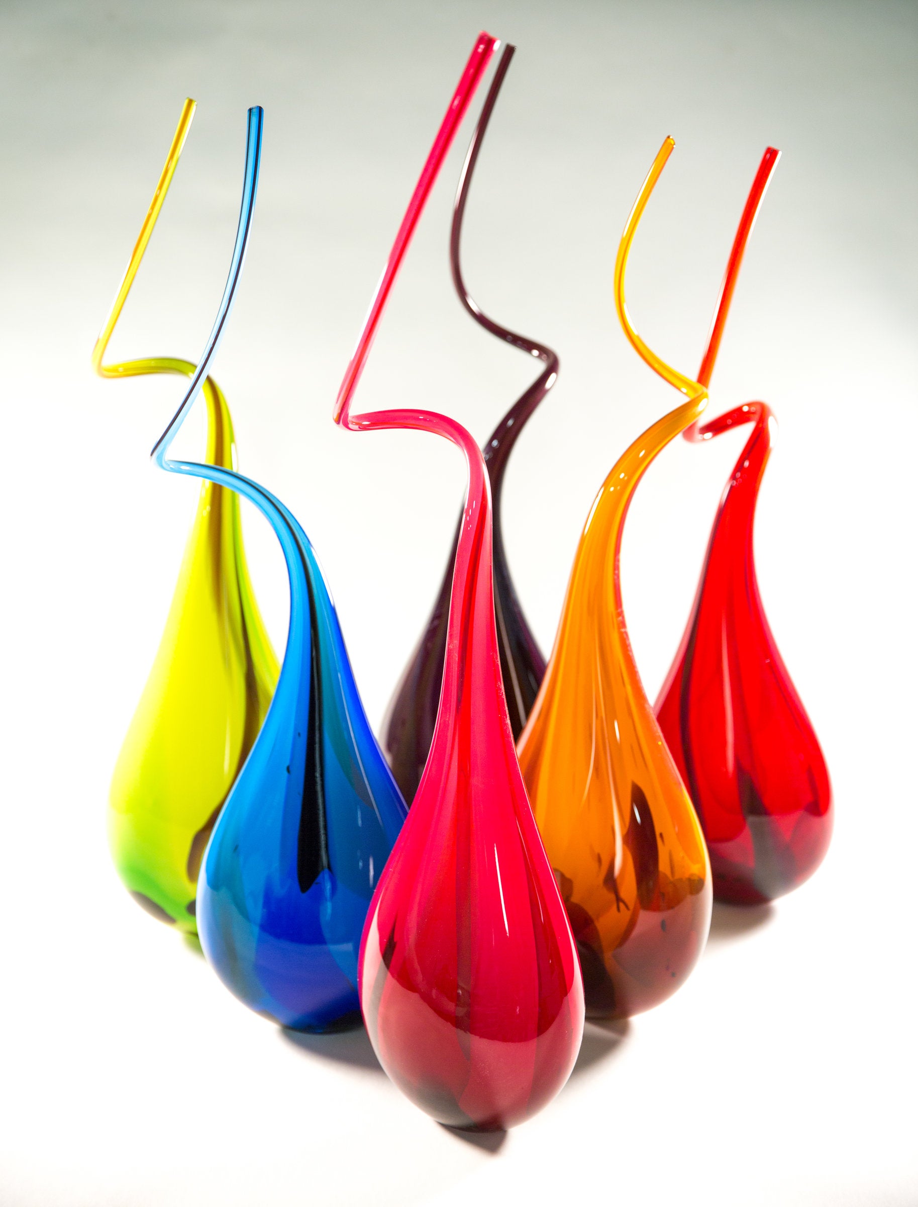 front to back, left to right: fuchsia, blue, gold, lime, purple, red