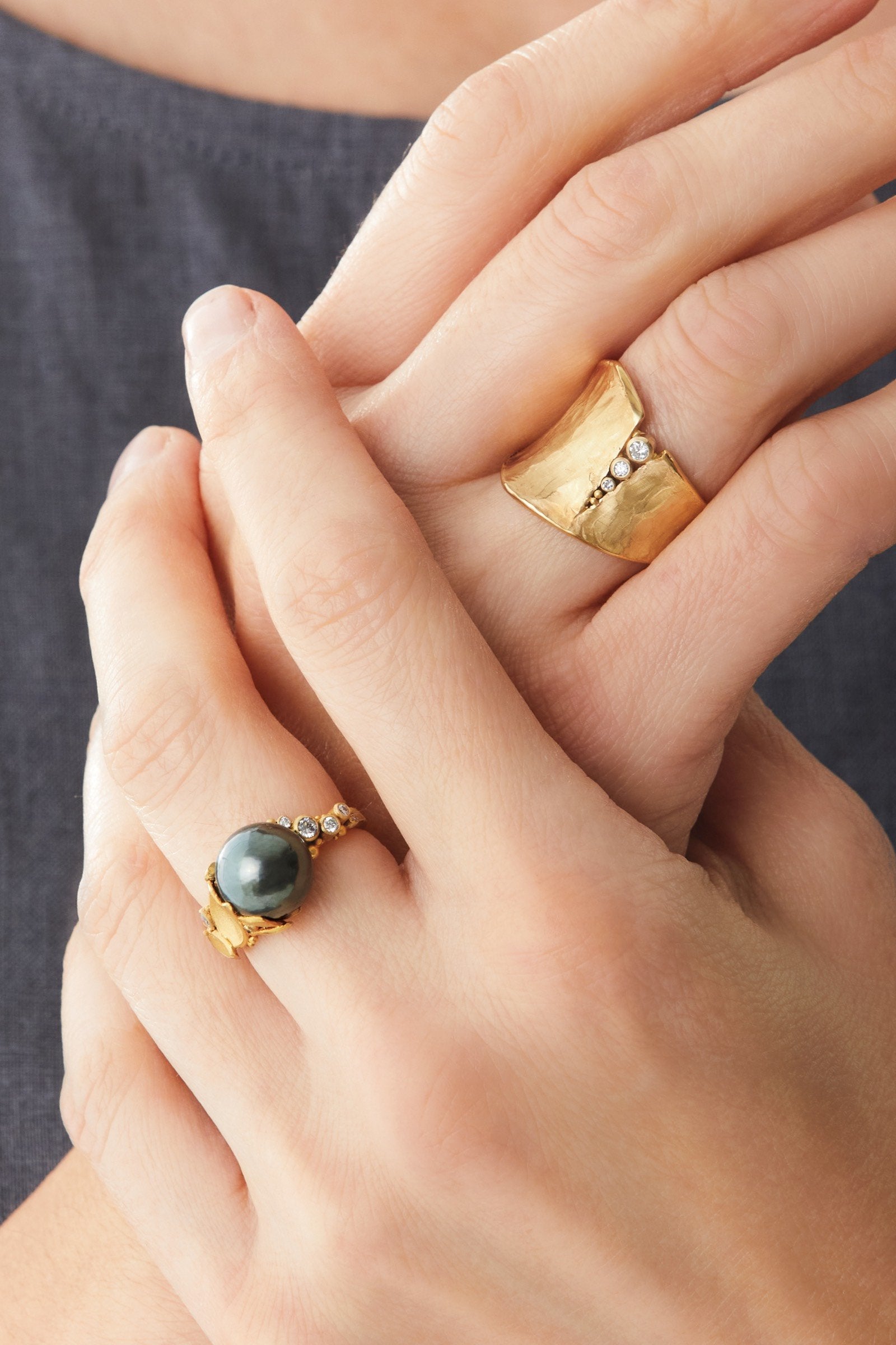 shown with the artist's Black Tahitian Pearl Ring