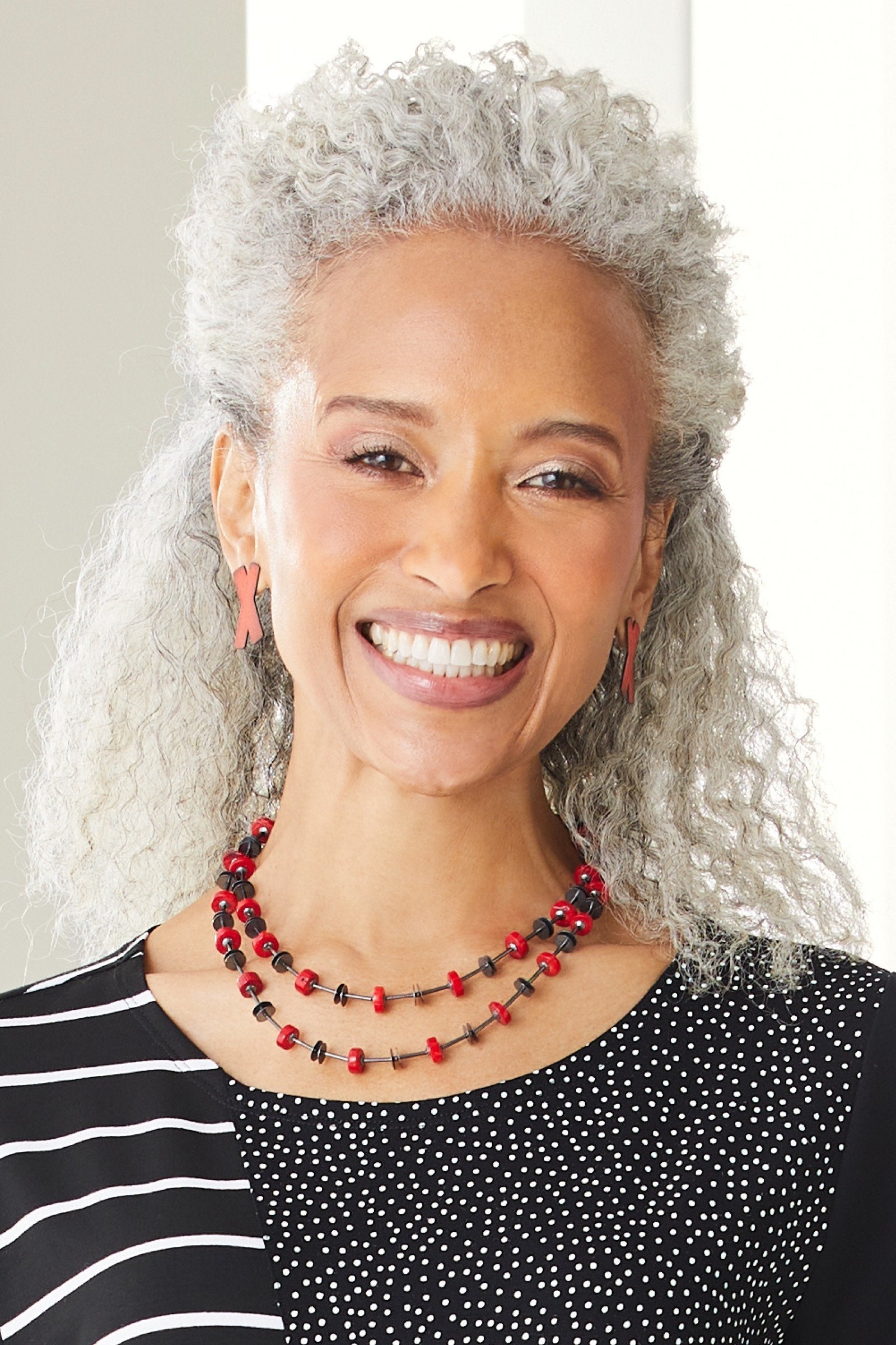 shown with the Coral Oxidized Necklace by Laurette O'Neil