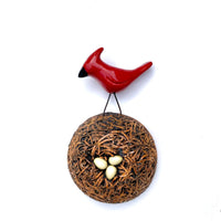 Red Bird on Nest