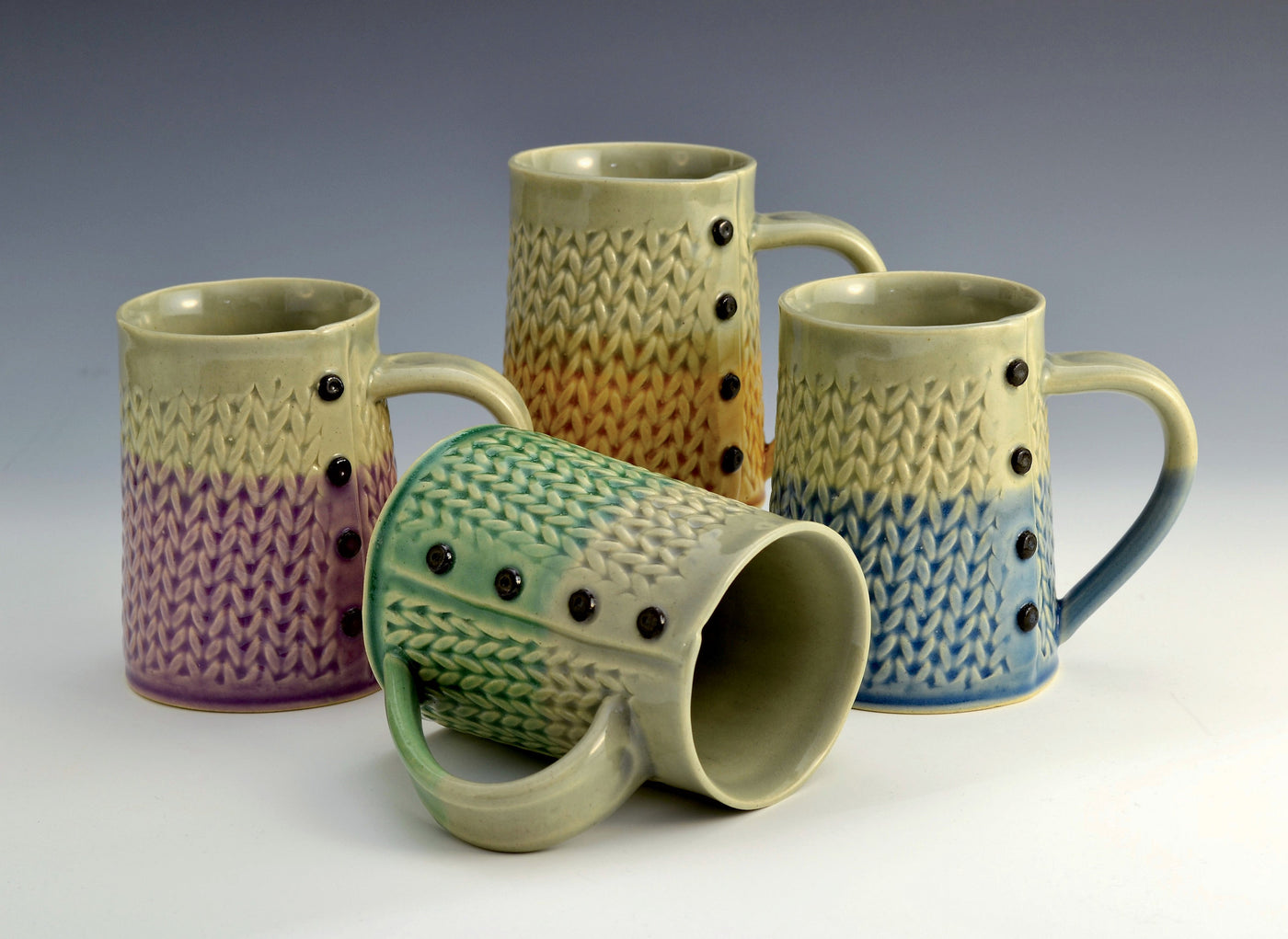 left to right: purple, green, gold, blue
