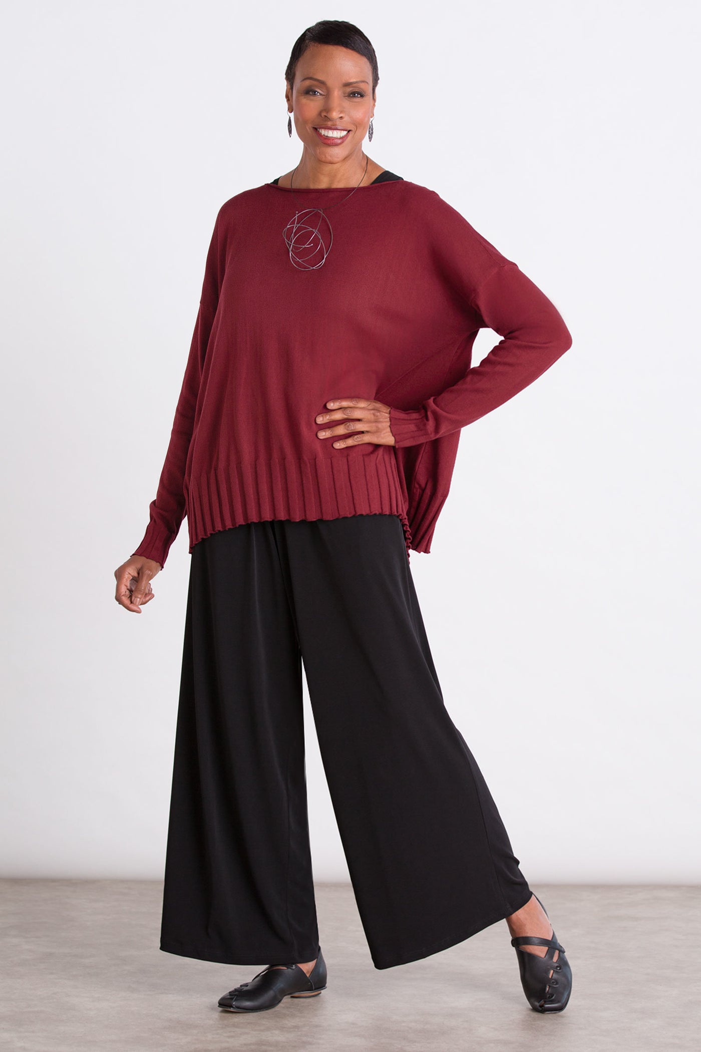 shown with boat neck rib sweater by planet