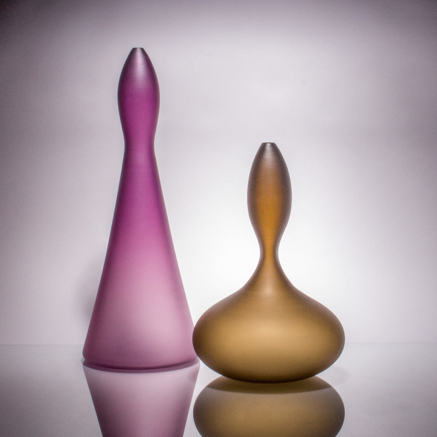left to right: Tall Purple, Squat Taupe