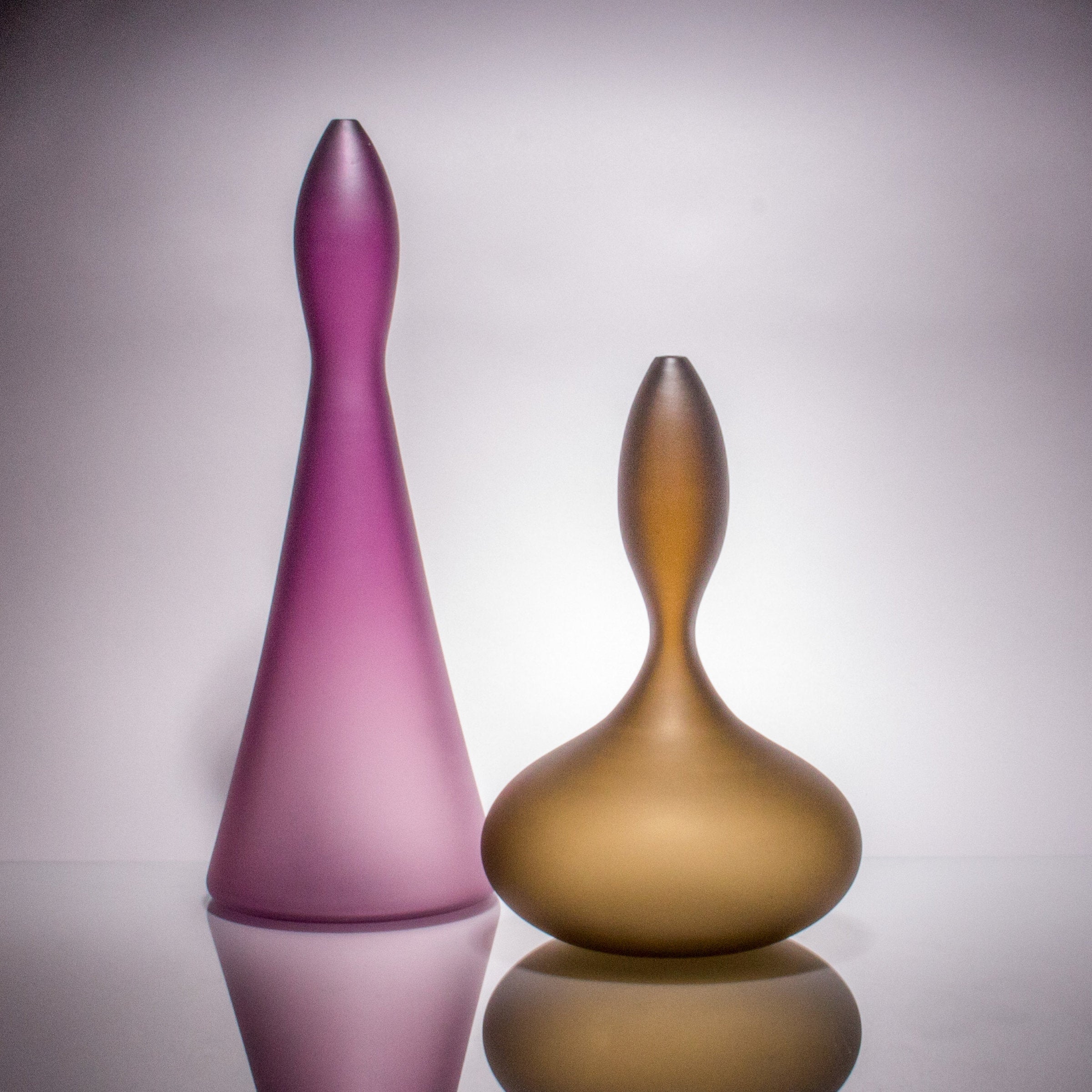 left to right: Tall Purple, Squat Taupe