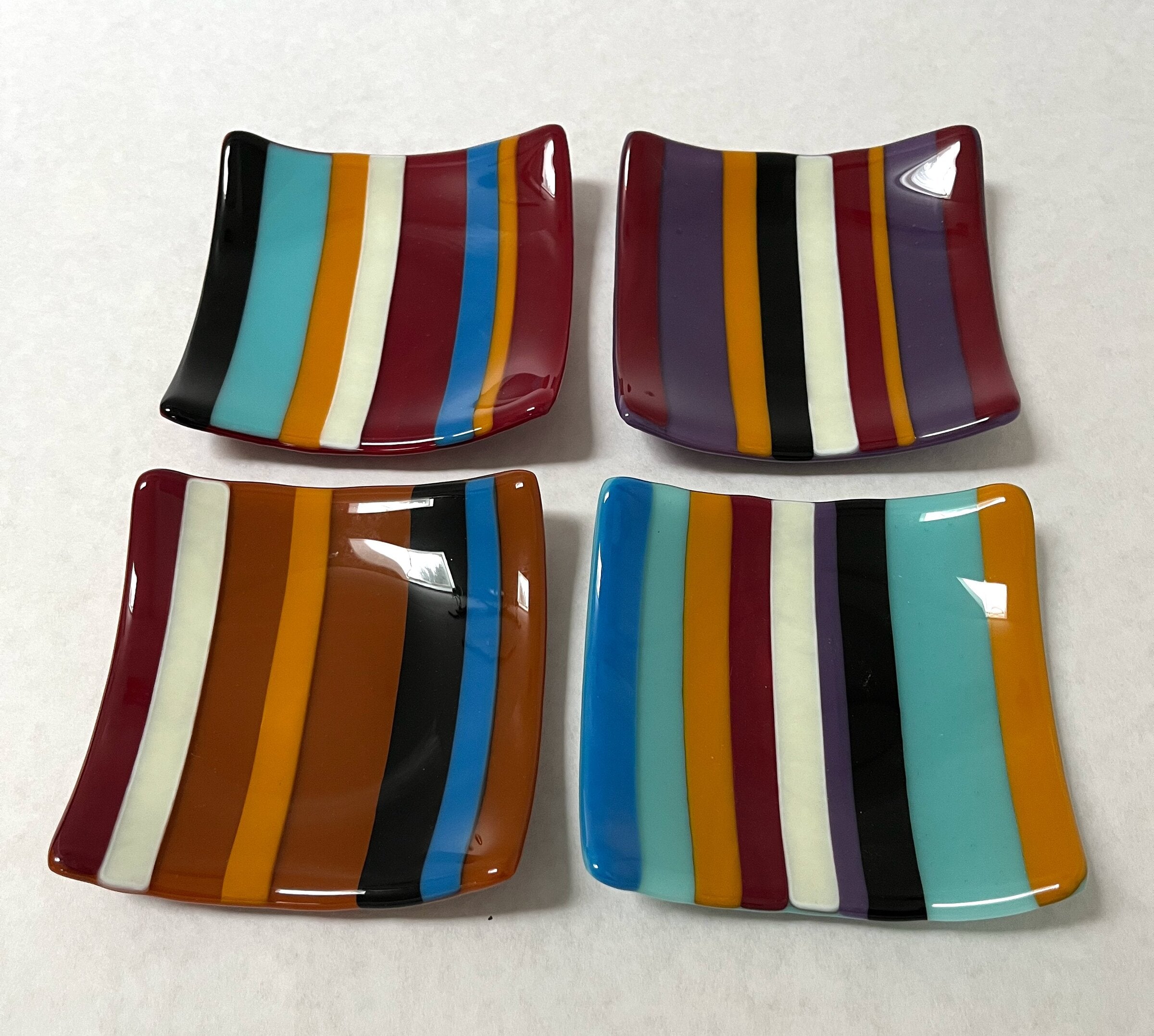 Four Stripey Plates