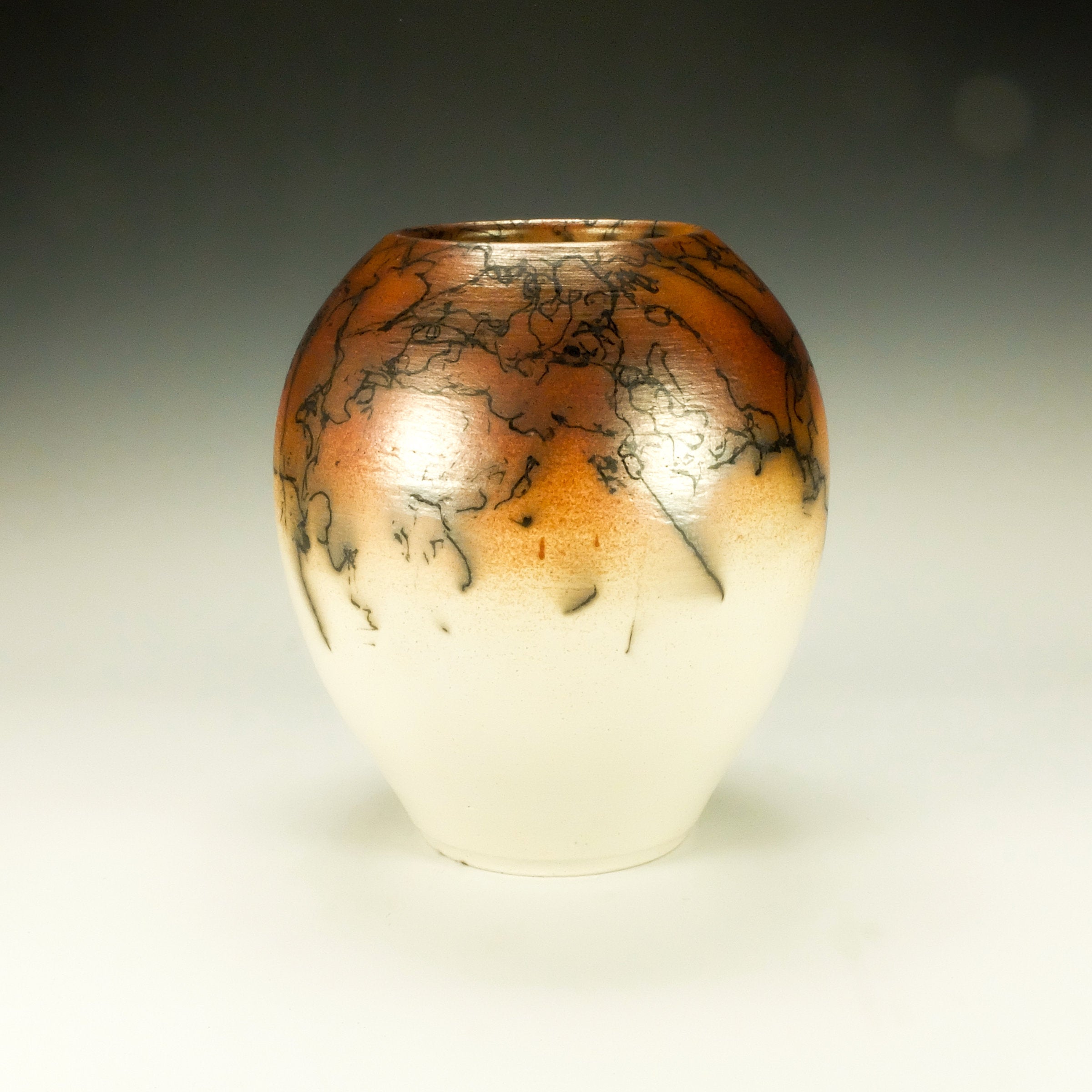 Orange, Black and White Raku Pottery