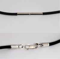 rubber cord with bayonet clasp (top) and leather cord with lobster clasp (bottom)