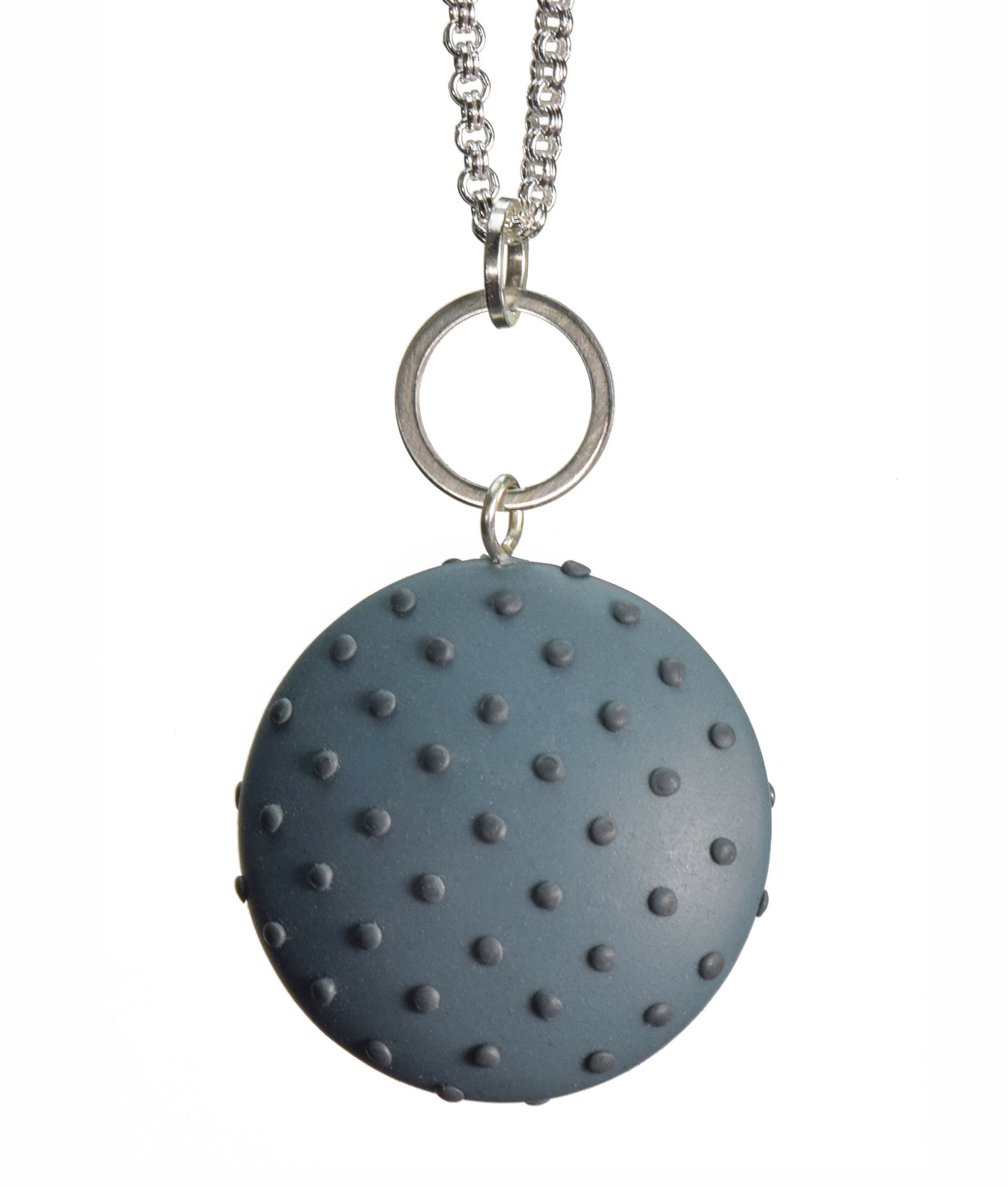 Dark teal with dots