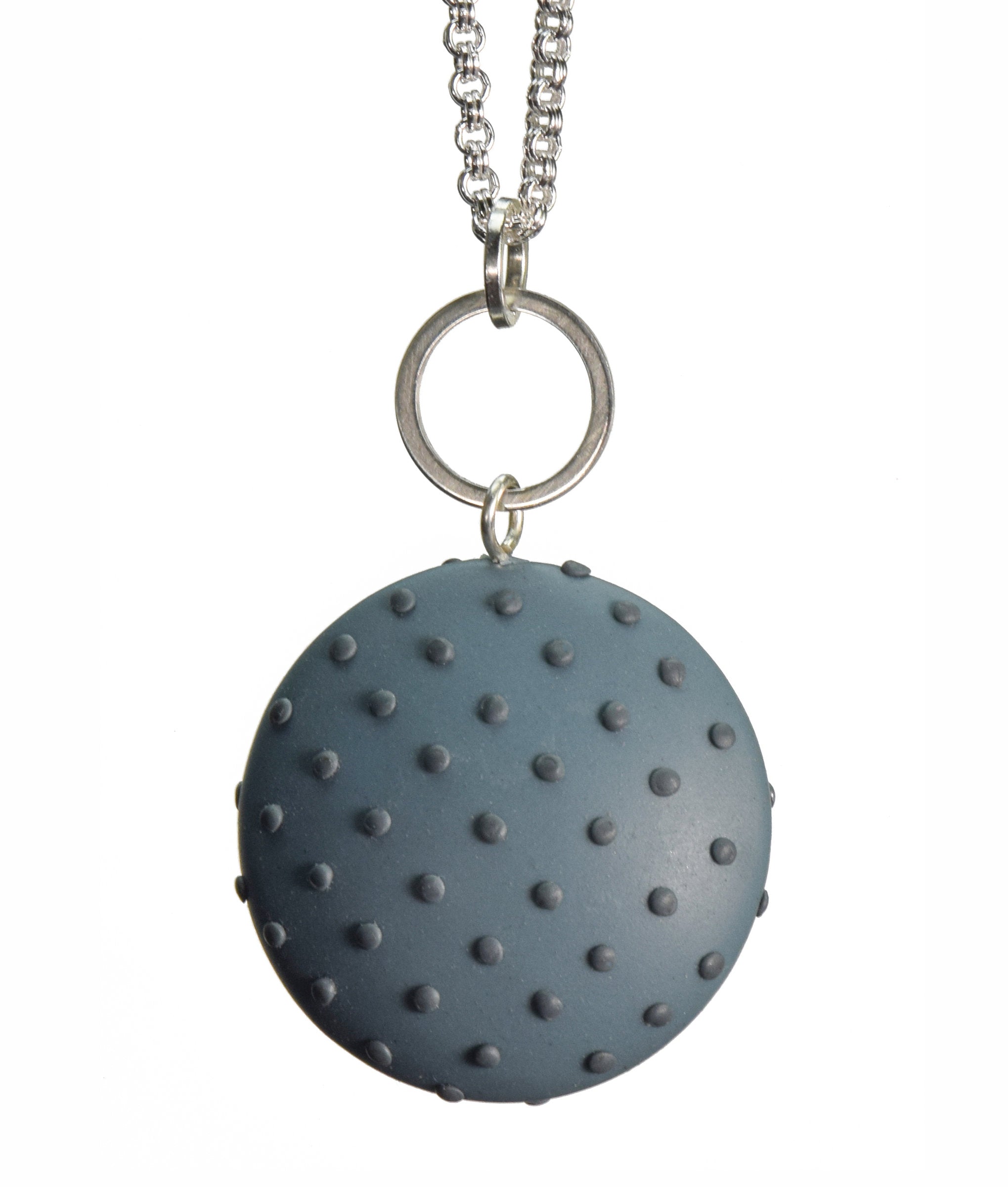 Dark teal with dots