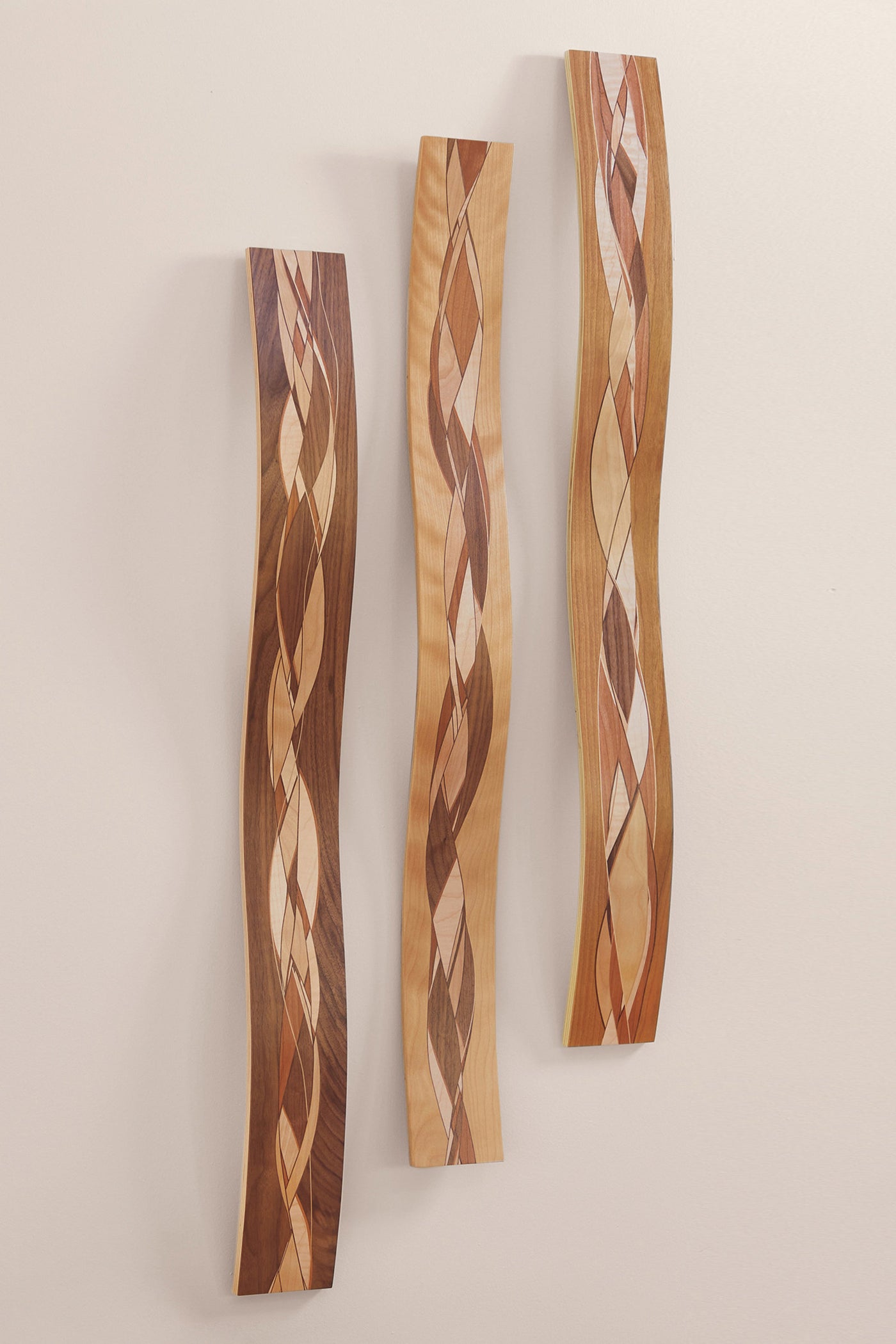 left to right: Walnut edge, flame birch edge, Cherry
