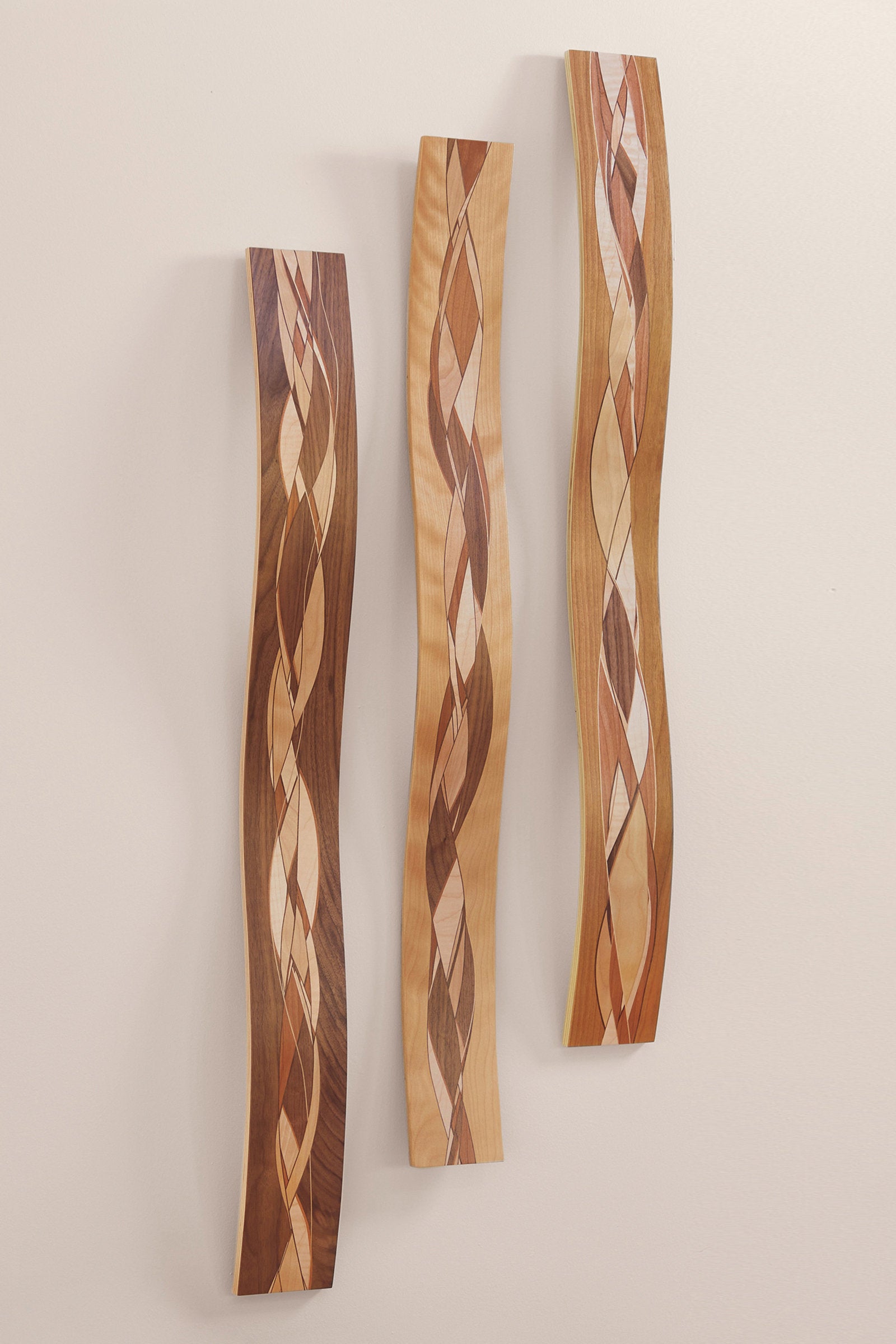 left to right: Walnut edge, flame birch edge, Cherry