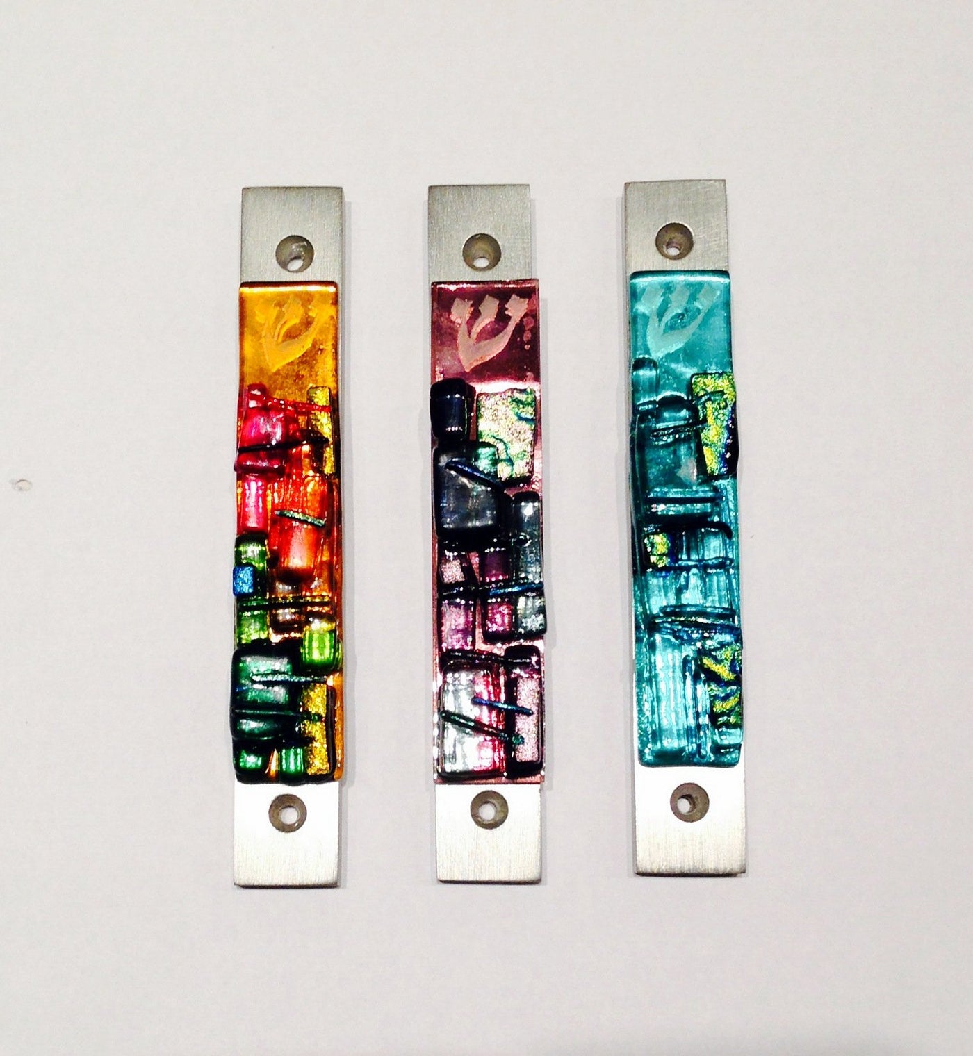 left to right: multicolor, rose, aqua